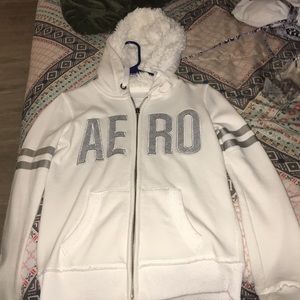 A white Aeropostale jacket with a fluffy hood